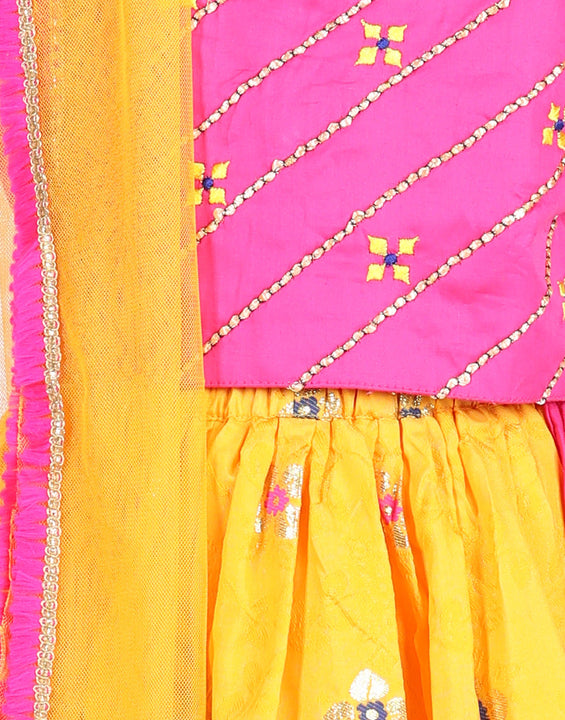 Pink brocade top with yellow lehenga and dupatta