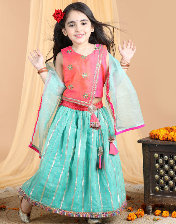 Pink Top with green gold printed lehenga and dupatta