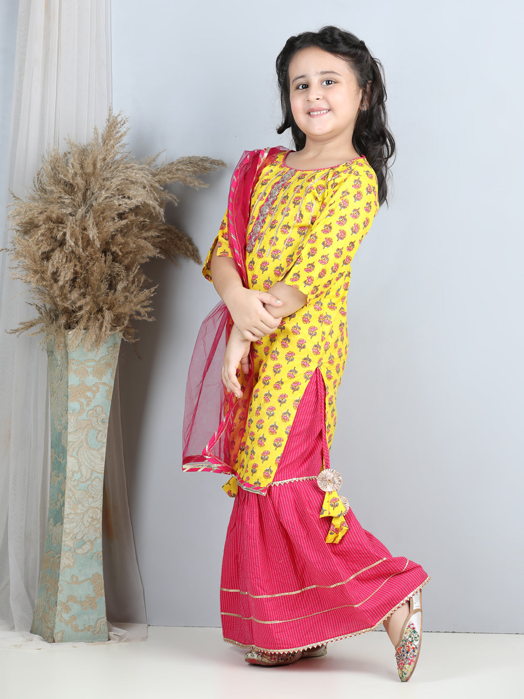 Yellow Printed kurti with Pink sharara with dupatta